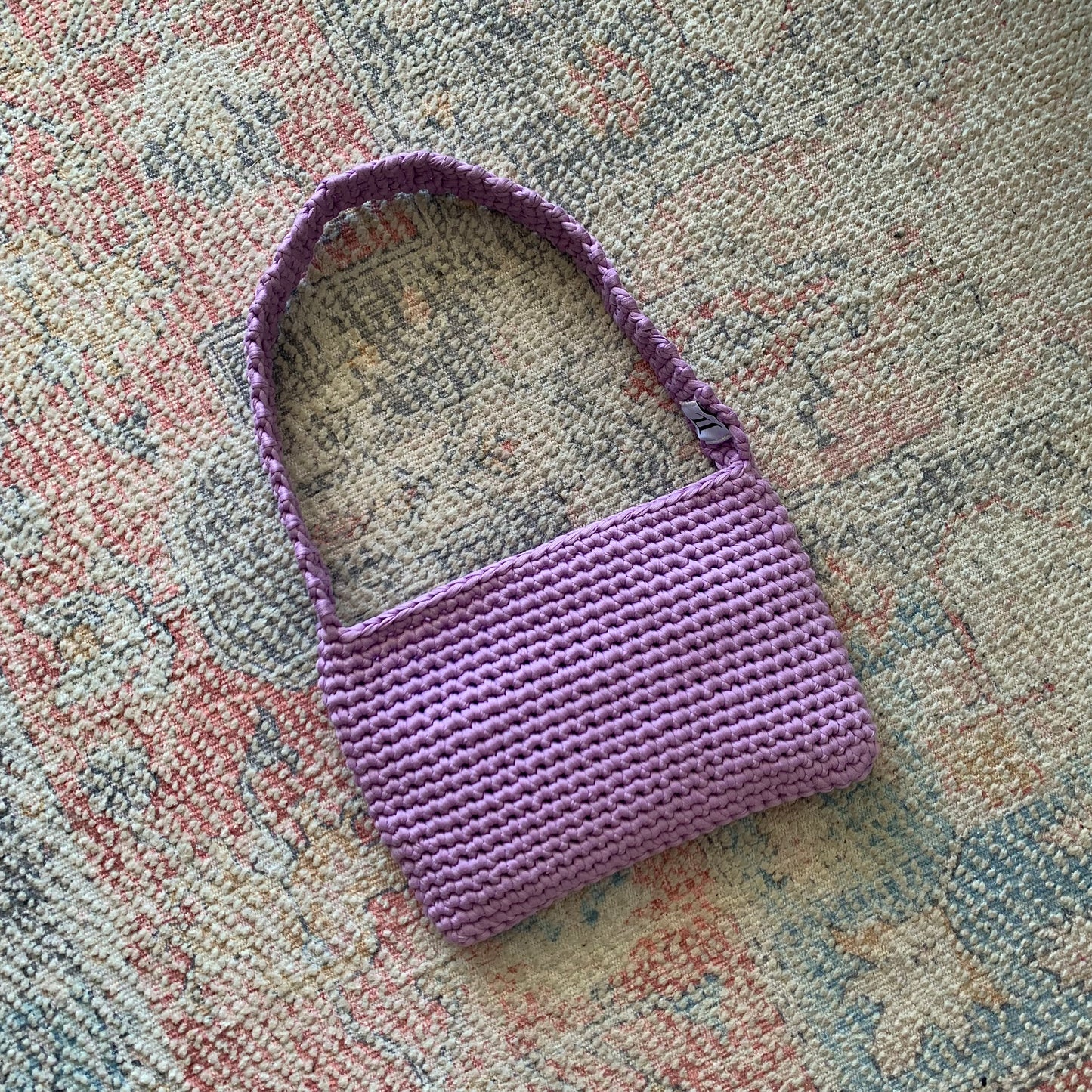 light purple handbag